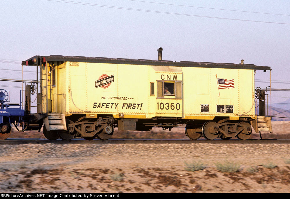 Chicago & Northwestern caboose CNW #10360 on WB APL train.